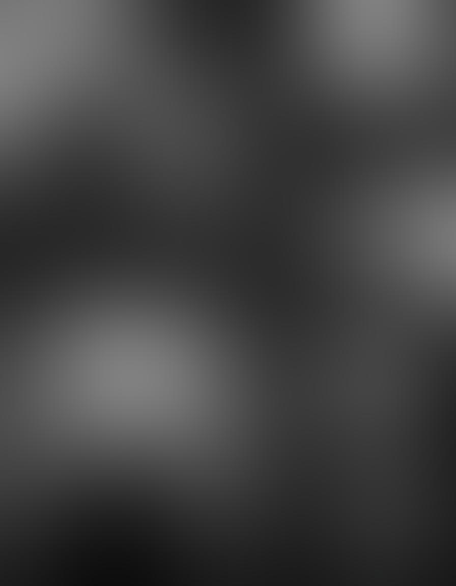 A collage representing the evolution of adult entertainment, featuring a vintage film projector casting classic black and white films on one side, transitioning to modern digital screens showing contemporary sensual videos on the other. Include iconic imagery from different eras, such as a retro film reel, a modern tablet, and silhouettes of couples in varied intimate poses. Emphasize the contrast between static and dynamic visuals with a gradient background showcasing the passage of time. vibrant colors. super-realistic.